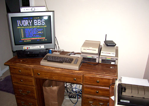 A classic dial-up bulletin board system setup from the 1980s